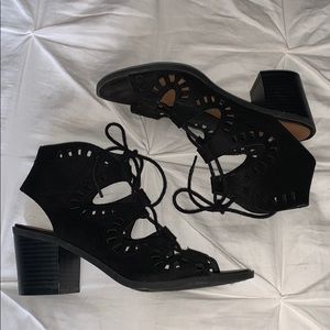 Black heels with lace up detailing